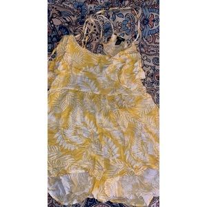 Yellow romper that is backless